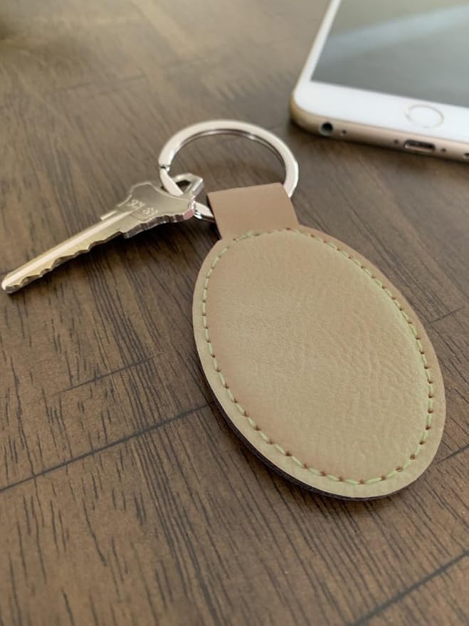 LaserGram Oval Keychain, Golfer Golfing, Personalized Engraving Included (Beige)