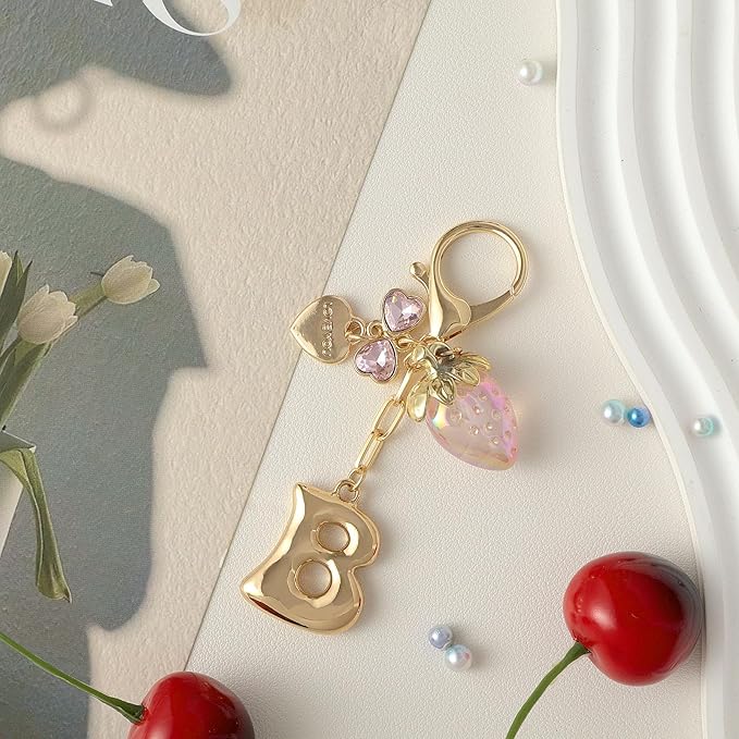 Snycler Bubble Initial Keychain with Strawberry & Bow- Gold Letter Bag Charms for Women, Cute Purse Handbag Accessories