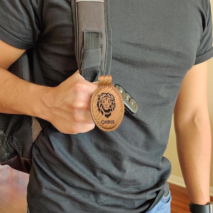 LaserGram Oval Keychain, Golfer Golfing, Personalized Engraving Included (Carbon Fiber Bronze)
