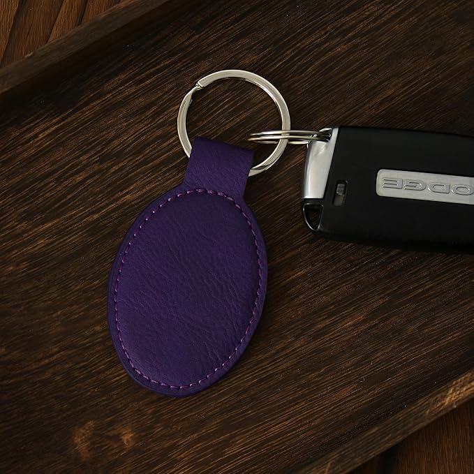 LaserGram Oval Keychain, Golfer Golfing, Personalized Engraving Included (Dark Purple)