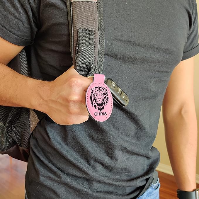 LaserGram Oval Keychain, Golfer Golfing, Personalized Engraving Included (Pink)